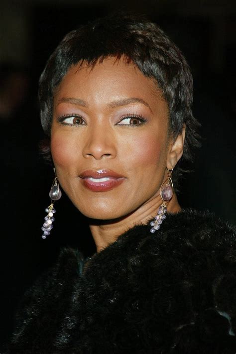 A Look Back At Angela Bassetts Most Iconic Beauty Moments Essence Essence