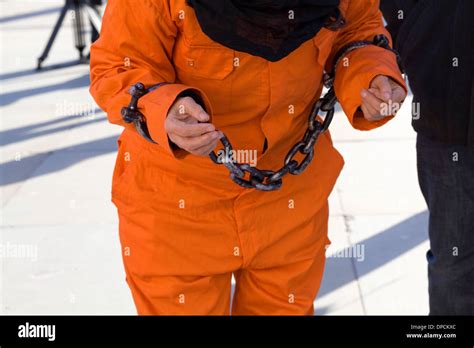 Protestors in Orange Suits marking the twelfth anniversary of the ...