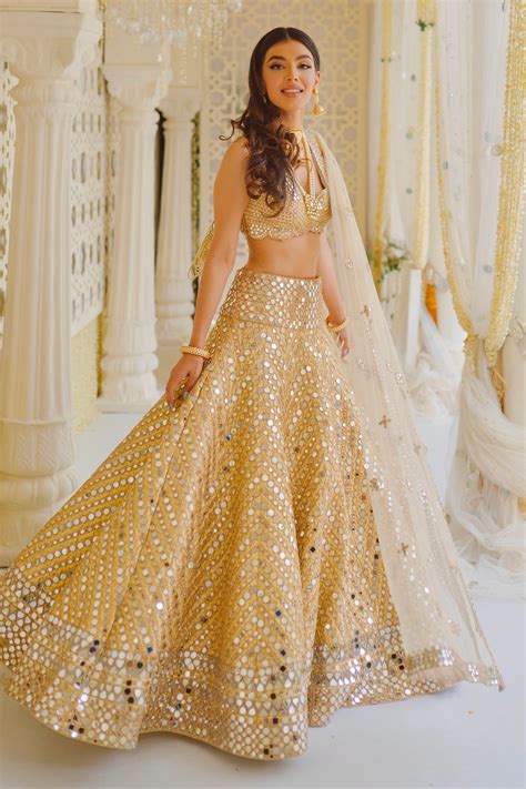 Buy Gold Net Embellished Mirror V Neck Work Bridal Lehenga Set For