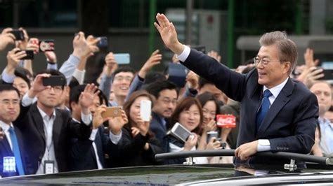 South Koreas Moon Jae In Sworn In Vowing To Address North Bbc News