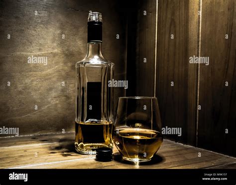 Liquor Bottle And Glass Stock Photo Alamy