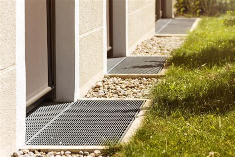 Premium Photo Gutter Drain For Water In Front Of Door Drainage