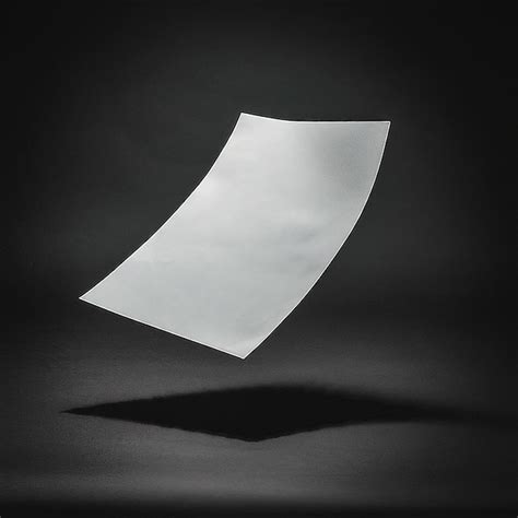 A White Piece Of Paper That Has A White Piece Of Paper On It Premium