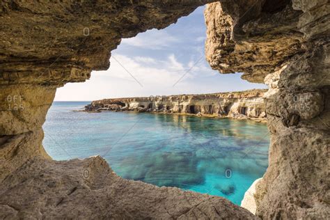 Sea Caves Along Rocky Coast By Mediterranean Sea At Sunset Cape Greco