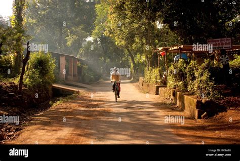 A village man on bicycle at Kokan Stock Photo - Alamy