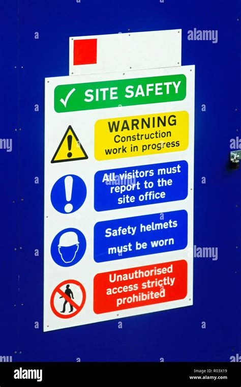 Warning Signs On A Construction Site For Safety Procedure Stock Photo