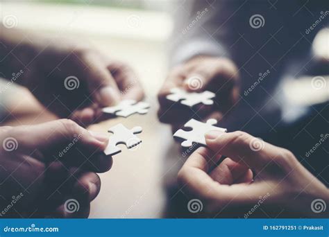 Hand Holding Jigsaw Puzzles Business Partnership Stock Image Image