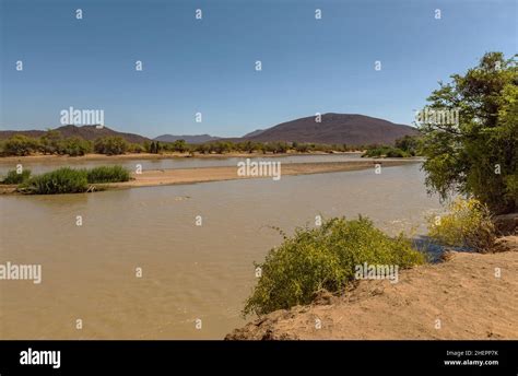 Landscape At The Kunene River Border Rivers Of Namibia And Angola