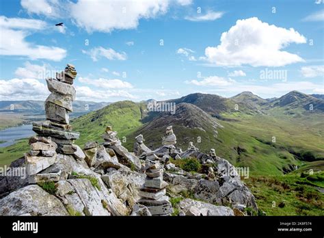 Stone Towers In Connemara National Park With Beautiful Mountains In The