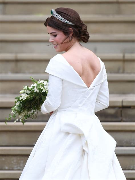 Princess Eugenie wedding in pictures: Splendid hats and gusts of wind ...