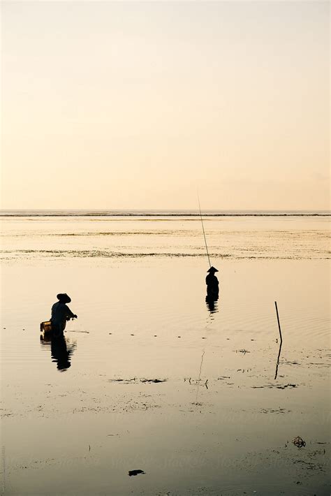 Fishermen At Sunrise By Stocksy Contributor Sam Burton Stocksy