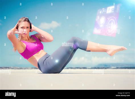 Composite Image Of Focused Fit Blonde Doing Yoga On The Beach Stock