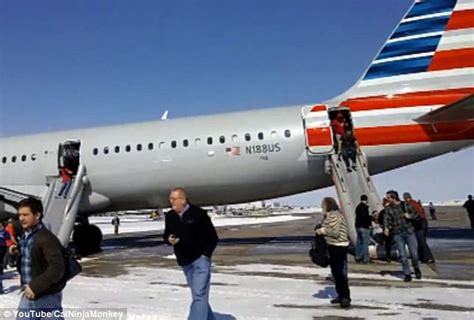 American Airlines Passengers Use Emergency Slides As Smoke Fills Cabin In Denver Daily Mail Online