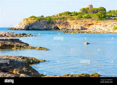 Rocky Coast Of The Xinxell Cove At Ses Illetes In Mallorca At