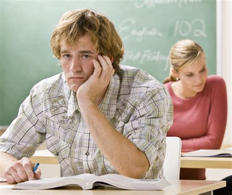 Bored Student At Desk In Classroom Stock Image Image Of Western