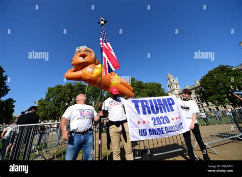 An Inflated Blimp Of London Mayor Sadiq Khan Depicted In A Bikini