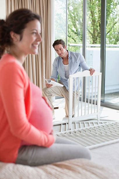 Couple Building Crib Stock Photos Pictures And Royalty Free Images Istock