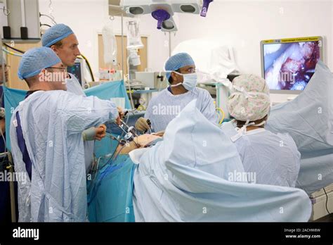 Hernia Surgery Surgeons Performing A Laparascopic Keyhole Repair Of