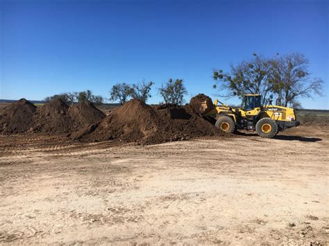 Topsoil Piles Arrow Materials Inc