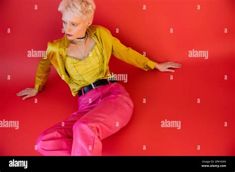 High Angle View Of Blonde Albino Model In Trendy Clothes Posing On