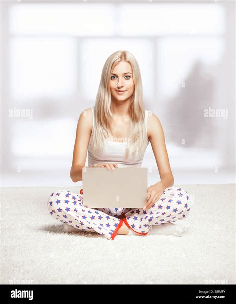 Blonde Woman With Laptop Stock Photo Alamy