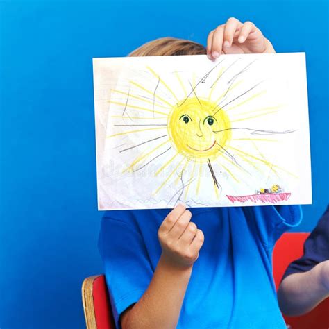 Child Showing Drawing With Sun And Ocean Stock Photo Image Of Lake