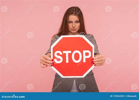 No Prohibited Portrait Of Strict Bossy Girl Looking Angrily And Showing Stop Gesture Holding