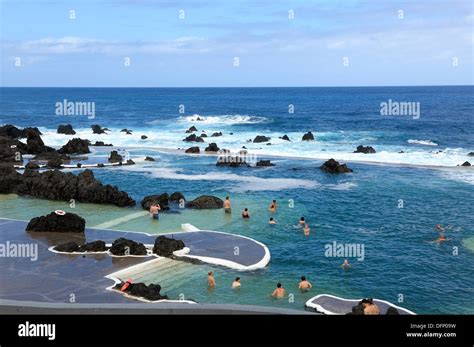 Madeira Portugal Tourists Swimming And Bathing In The Lava Rock Pools