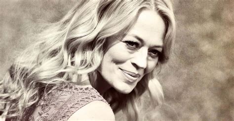 Download Jeri Ryan Striking A Pose In A Stunning Photo Shoot Wallpaper