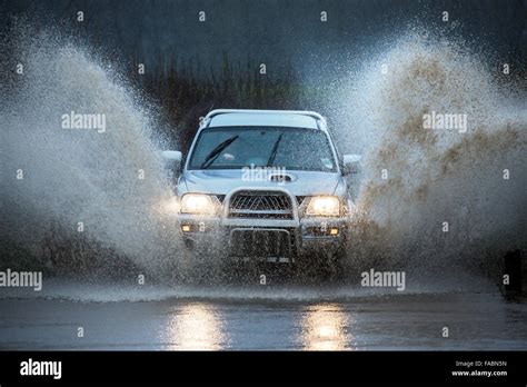 Car Driving Through Floodwater Hi Res Stock Photography And Images Alamy