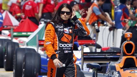 Danica Patrick Attempts To Burn Tires Out Of Jay Lenos Aston Martin