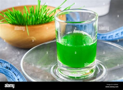 Wheatgrass Shot Juice From Wheat Grass Trend Of Health Stock Photo