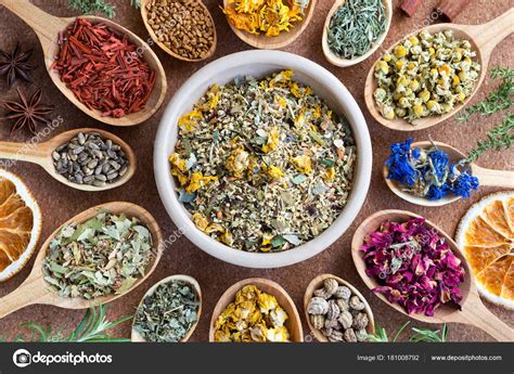 Mix Of Dried Herbs On Wooden Spoons Top View Stock Photo By