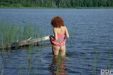 Cute Sunny Masturbates In The Water After Stripping Naked