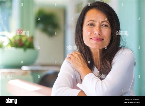 Portrait Of A Confident Mature Woman Smiling Stock Photo Alamy