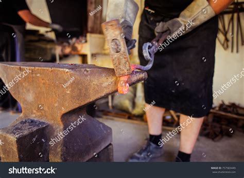Blacksmith Hitting Piece Hot Metal Hammer Stock Photo Shutterstock