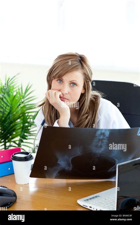 Happy Female Doctor Holding A Radiography Stock Photo Alamy