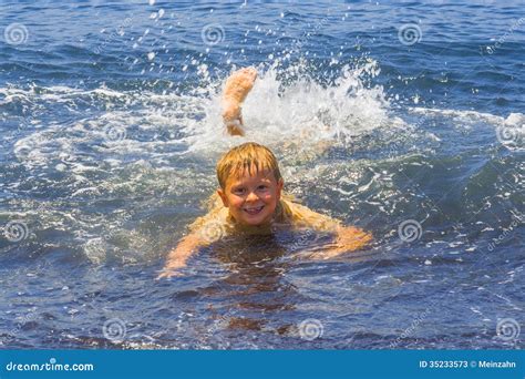 Boy Swimming In The Ocean Stock Image Image Of Game 35233573