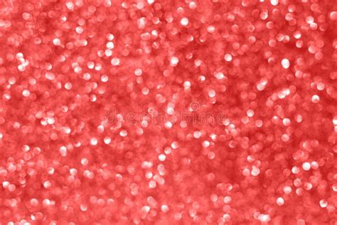 Living Coral Color Glitter Bokeh Festive And Sparkles Background Stock