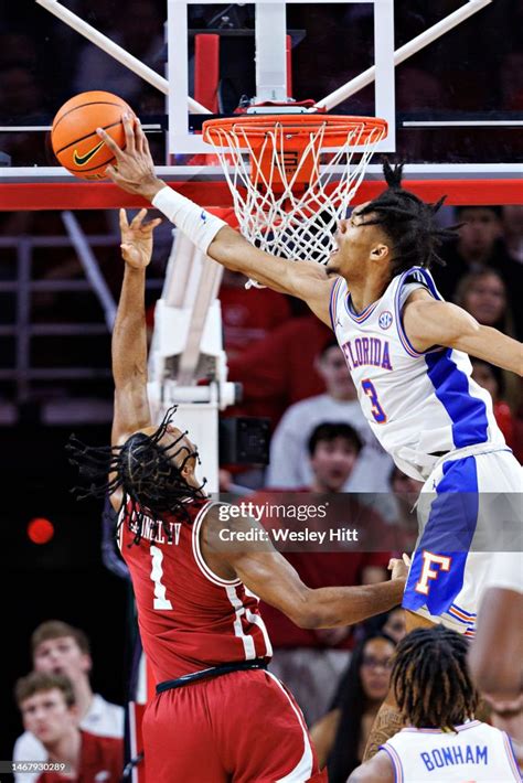 Alex Fudge Of The Florida Gators Blocks The Shot From Ricky Council