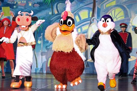 The Penguins Are Dancing On Stage With Other Performers