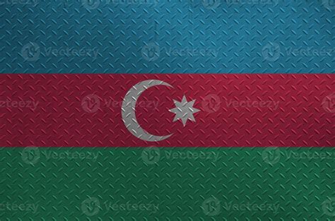 Azerbaijan flag depicted in paint colors on old brushed metal plate or ...