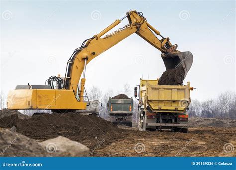 Digger Loading Trucks With Soil Stock Photo Image Of Digger Load