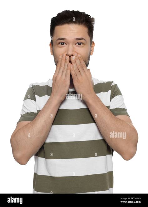 Embarrassed Man Covering Mouth With Hands On White Background Stock