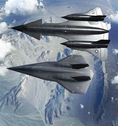 Two Fighter Jets Flying In The Sky Above Mountains