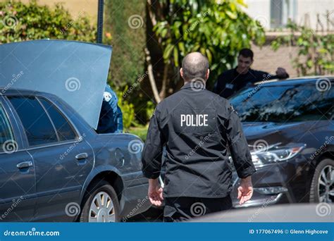 A White Male Detective From Lapd`s Metro Division Walks By Police