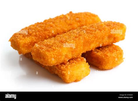 Four Golden Fried Fish Fingers Stacked On White Stock Photo Alamy