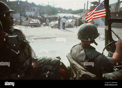 Members Of The 24th Marine Amphibious Unit MAU Patrol The Streets Of