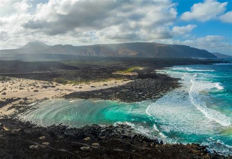 Landscape With Turquoise Ocean Water On Caleta Del Mojon Blanco In