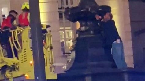 Man Arrested After Climbing Londons Eros Statue In Piccadilly Circus